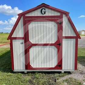 White 8x12 Graceland barn with red trim